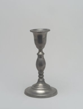 Morey and Smith. <em>Candlestick (One of a Pair)</em>, 1857–1860. Pewter, 7 1/4 x 3 7/8 x 3 7/8 in. (18.4 x 9.8 x 9.8 cm). Brooklyn Museum, Designated Purchase Fund, 45.10.28. Creative Commons-BY (Photo: Brooklyn Museum, 45.10.28.jpg)