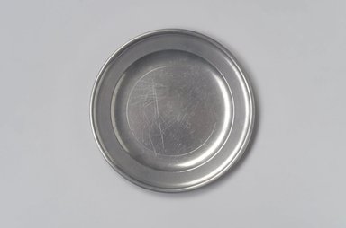 Joseph  Belcher Sr. or Joseph Belcher Jr.. <em>Plate</em>, 1769–1776 or 1776–1785. Pewter, 1/2 x 8 x 8 in. (1.3 x 20.3 x 20.3 cm). Brooklyn Museum, Designated Purchase Fund, 45.10.46. Creative Commons-BY (Photo: Brooklyn Museum, 45.10.46.jpg)