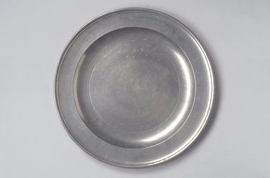 Thomas Badger, Jr.. <em>Plate</em>, 1787–1818. Pewter, 1 x 14 7/8 x 14 7/8 in. (2.5 x 37.8 x 37.8 cm). Brooklyn Museum, Designated Purchase Fund, 45.10.6. Creative Commons-BY (Photo: Brooklyn Museum, 45.10.6.jpg)