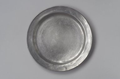 Amos Treadway. <em>Dish</em>, 1760–1793. Pewter, 1 1/8 x 11 1/4 x 11 1/4 in. (2.9 x 28.6 x 28.6 cm). Brooklyn Museum, Designated Purchase Fund, 45.10.63. Creative Commons-BY (Photo: Brooklyn Museum, 45.10.63.jpg)