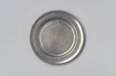 Thomas Danforth II. <em>Plate</em>, 1755–1782. Pewter, 5/8 x 7 15/16 x 7 15/16 in. (1.6 x 20.2 x 20.2 cm). Brooklyn Museum, Designated Purchase Fund, 45.10.70. Creative Commons-BY (Photo: Brooklyn Museum, 45.10.70.jpg)