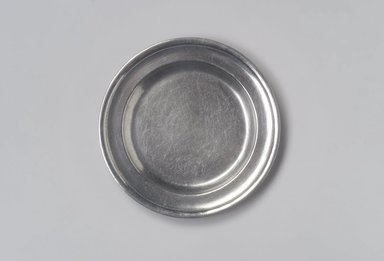 John Danforth. <em>Plate</em>, 1773–1793. Pewter, 5/8 x 7 3/4 x 7 3/4 in. (1.6 x 19.7 x 19.7 cm). Brooklyn Museum, Designated Purchase Fund, 45.10.73. Creative Commons-BY (Photo: Brooklyn Museum, 45.10.73.jpg)