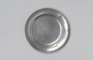 Jacob Whitmore. <em>Plate</em>, 1758–1790. Pewter, 5/8 x 7 7/8 x 7 7/8 in. (1.6 x 20 x 20 cm). Brooklyn Museum, Designated Purchase Fund, 45.10.74. Creative Commons-BY (Photo: Brooklyn Museum, 45.10.74.jpg)