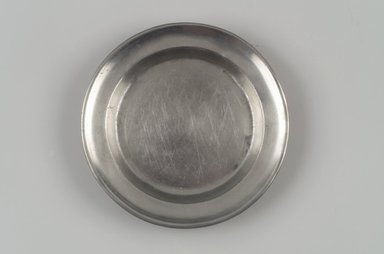 Thomas Danforth Boardman (American, 1784–1873). <em>Plate</em>, 1805–1820. Pewter, 3/4 x 6 1/8 x 6 1/8 in. (1.9 x 15.6 x 15.6 cm). Brooklyn Museum, Designated Purchase Fund, 45.10.78. Creative Commons-BY (Photo: Brooklyn Museum, 45.10.78.jpg)