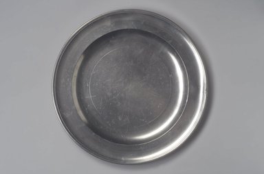 Thomas Danforth Boardman (American, 1784–1873). <em>Dish</em>, 1805–1820. Pewter, 3/4 x 12 1/4 x 12 1/4 in. (1.9 x 31.1 x 31.1 cm). Brooklyn Museum, Designated Purchase Fund, 45.10.86. Creative Commons-BY (Photo: Brooklyn Museum, 45.10.86.jpg)