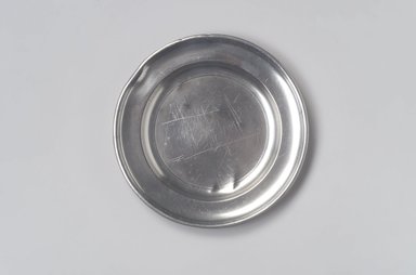 Samuel Danforth. <em>Plate</em>, 1793–1802. Pewter, 5/8 x 7 7/8 x 7 7/8 in. (1.6 x 20 x 20 cm). Brooklyn Museum, Designated Purchase Fund, 45.10.88. Creative Commons-BY (Photo: Brooklyn Museum, 45.10.88.jpg)