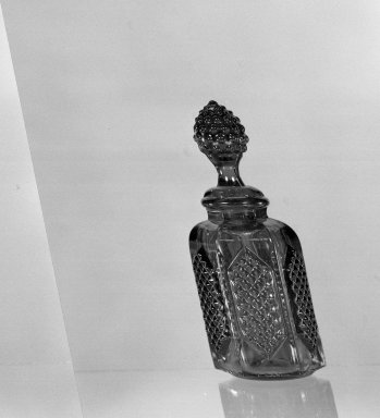 American. <em>Bottle and Stopper</em>, ca. 1869. Glass, H: 6 1/2 in. (16.5 cm). Brooklyn Museum, Dick S. Ramsay Fund, 45.143.33a-b. Creative Commons-BY (Photo: Brooklyn Museum, 45.143.33a-b_acetate_bw.jpg)