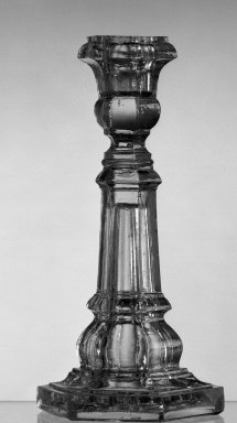 American. <em>Candlestick</em>, ca. 1845-1850. Glass, 8 x 3 1/2 in. (20.3 x 8.9 cm). Brooklyn Museum, Dick S. Ramsay Fund, 45.143.38. Creative Commons-BY (Photo: Brooklyn Museum, 45.143.38_acetate_bw.jpg)