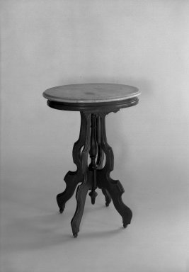 T. Brooks & Company. <em>Oval Table</em>. Marble top on walnut frame Brooklyn Museum, Gift of Eleanor Curnow in memory of her mother, Mary Griffith Curnow, 45.25.4. Creative Commons-BY (Photo: Brooklyn Museum, 45.25.4_acetate_bw.jpg)