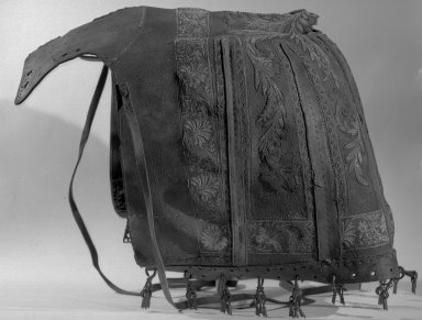  <em>Caparison or saddle trappings (Anquera)</em>, 18th century. Embroidered leather; silk, metallic thread, vegetable fiber, iron, 19 1/2 x 18 x 15 1/2 in. Brooklyn Museum, A. Augustus Healy Fund, 45.38.1. Creative Commons-BY (Photo: Brooklyn Museum, 45.38.1_acetate_bw.jpg)