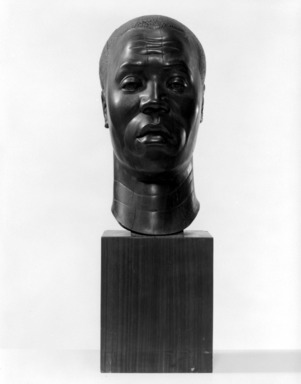 Harry Levine (American, born Russia, 1893–1945). <em>Negro Head</em>, n.d. Lignum vitae (wood), With Base: 18 × 5 5/8 × 7 3/4 in., 15 lb. (45.7 × 14.3 × 19.7 cm, 6.8kg). Brooklyn Museum, Gift of the Educational Alliance Art School, 45.67.1. © artist or artist's estate (Photo: Brooklyn Museum, 45.67.1_bw.jpg)