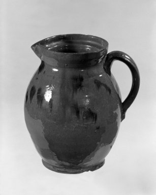 American. <em>Pitcher with Cover</em>, 19th century. Glazed earthenware, 7 3/8 x 3 3/4 in. (18.7 x 9.5 cm). Brooklyn Museum, Gift of Arthur W. Clement, 46.1.11. Creative Commons-BY (Photo: Brooklyn Museum, 46.1.11_bw.jpg)
