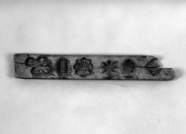 Chippewa (Anishinaabe). <em>Sugar Mold</em>. Wood, 49.3 x 7.5 x 2.7 cm / 19 3/8 x 3 x 1 in. Brooklyn Museum, By exchange, 46.100.21. Creative Commons-BY (Photo: Brooklyn Museum, 46.100.21_bw.jpg)