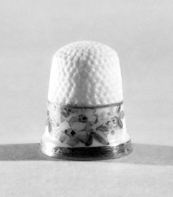 American. <em>Thimble</em>, ca. 1883-1892. Porcelain, 3/4 x 5/8 in. (1.9 x 1.6 cm). Brooklyn Museum, Gift of Julie Husson, 46.144.5. Creative Commons-BY (Photo: Brooklyn Museum, 46.144.5_bw.jpg)