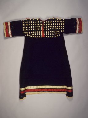 Sioux. <em>Dress</em>, late 19th-early 20th century. Wool cloth, elk  teeth,(or teeth carved from horn) silk ribbon, brass and tin sequins, 49 5/8 x 36 1/4 in. (126 x 92.1 cm). Brooklyn Museum, Charles Stewart Smith Memorial Fund, 46.96.13. Creative Commons-BY (Photo: Brooklyn Museum, 46.96.13.jpg)