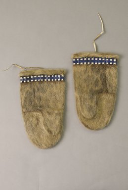 Kalaallit (Greenlander Eskimo). <em>Pair of Mittens with blue and white checked leather trim</em>, early 20th century. Fur, hide, dye, 11 x 6 1/4 in. or (28.0 x 15.5 cm) each. Brooklyn Museum, Gift of Sidney Weiner and Harry Hurdy, 47.172.6a-b. Creative Commons-BY (Photo: Brooklyn Museum, 47.172.6a-b_front_PS5.jpg)