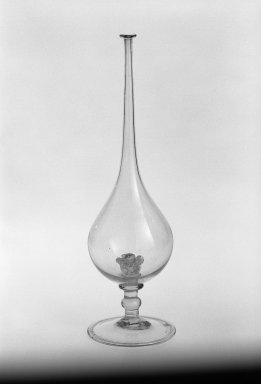  <em>Rosewater Bottle</em>, 18th-19th century. Translucent colorless glass; mold blown; tooled on the pontil, 12 5/8 x 3 3/8 in. (32 x 8.5 cm). Brooklyn Museum, Henry L. Batterman Fund, 47.203.17. Creative Commons-BY (Photo: Brooklyn Museum, 47.203.17_bw.jpg)