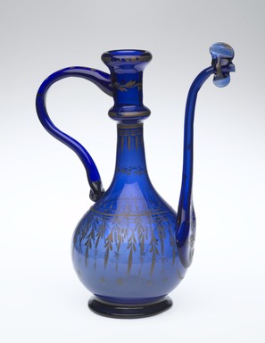  <em>Water Pitcher</em>, 19th century. Translucent deep blue glass; free blown, applied, pinched, and gilded; tooled on the pontil, 10 1/4 x 7 1/2 x 4 5/16 in. (26 x 19 x 11 cm). Brooklyn Museum, Henry L. Batterman Fund, 47.203.19. Creative Commons-BY (Photo: Brooklyn Museum, 47.203.19_side1_PS2.jpg)
