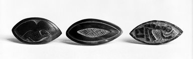 Beti. <em>Gambling Chip or Abbia Stone</em>, 19th-20th century. Fruit pit, (approx. 4.0 x 2.0 cm). Brooklyn Museum, Gift of Julius Carlebach, 47.222.3. Creative Commons-BY (Photo: , 47.222.1_47.222.2_47.222.3_bw.jpg)