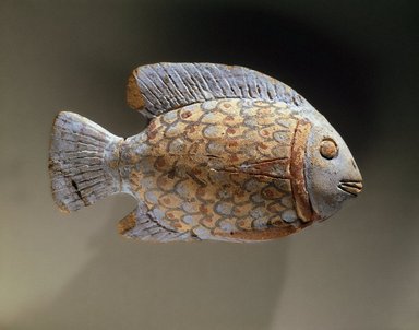  <em>Fish</em>, ca. 1390-1336 B.C.E. Clay, pigment, 2 9/16 x 4 7/16 x 1 1/4 in. (6.5 x 11.2 x 3.2 cm). Brooklyn Museum, Charles Edwin Wilbour Fund, 48.111. Creative Commons-BY (Photo: Brooklyn Museum, 48.111_SL1.jpg)