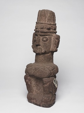 Aztec. <em>Seated Figure of Tlaloc</em>, ca. 1440-1521. Stone, 20 1/2 x 6 11/16 x 5 1/8 in. (52 x 17 x 13 cm). Brooklyn Museum, By exchange, 48.22.8. Creative Commons-BY (Photo: Brooklyn Museum, 48.22.8_threequarter_left_PS9.jpg)