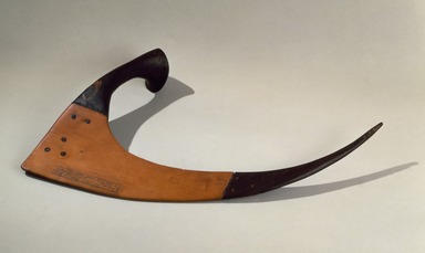  <em>Ceremonial Sickle of the "Fieldworker of Amun" Amunemhat</em>, ca. 1479-1425 B.C.E. Wood, pigment, Exterior: 9 × 13 1/2 × 2 in. (22.9 × 34.3 × 5.1 cm). Brooklyn Museum, Charles Edwin Wilbour Fund, 48.27. Creative Commons-BY (Photo: Brooklyn Museum, 48.27_SL3.jpg)