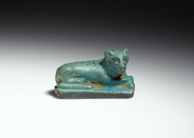  <em>Figure of Recumbent Lion on Oblong Base</em>, 305 B.C.E.–395 C.E. Faience, 1 1/2 x 1 x 2 9/16 in. (3.8 x 2.5 x 6.5 cm). Brooklyn Museum, Gift of Mr. and Mrs. Alastair Bradley Martin, 48.57. Creative Commons-BY (Photo: Brooklyn Museum, 48.57_front_PS2.jpg)