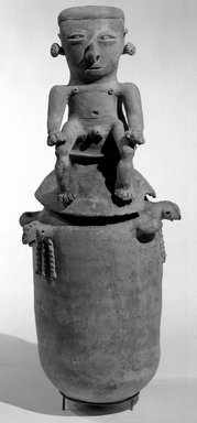 Moskito style. <em>Burial Urn with Male Effigy Figure</em>, 1000–1500 C.E. Ceramic, pigment, slip, A: 15 3/8 x 7 3/8 in. (39 x 18.7 cm). Brooklyn Museum, Frank L. Babbott Fund, 49.191.2a. Creative Commons-BY (Photo: Brooklyn Museum, 49.191.2a-b_acetate_bw.jpg)