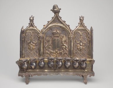  <em>Hanukkah Menorah</em>, late 19th century. Silver, 10 1/2 x 10 5/8 x 2 7/8 in. (26.7 x 27 x 7.3 cm). Brooklyn Museum, Purchased with funds given by Mr. and Mrs. Benjamin Abrams, 49.228.11. Creative Commons-BY (Photo: Brooklyn Museum, 49.228.11.jpg)