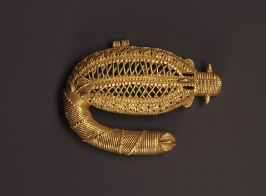 Ebrié. <em>Pendant in the Form of a Sawfish</em>, 19th century. Gold, 2 3/16 x 3/8 x 2 15/16 in. (5.5 x 1 x 7.5 cm). Brooklyn Museum, A . Augustus Healy Fund, 49.32.2. Creative Commons-BY (Photo: Brooklyn Museum, 49.32.2_SL1.jpg)