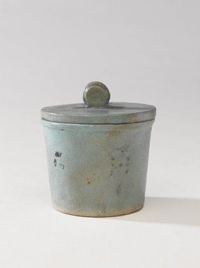  <em>One of a Set of Jars for Seven Sacred Oils or Unguents</em>, 305–30 B.C.E. Faience, 2 1/2 x 2 3/8 in. (6.4 x 6 cm). Brooklyn Museum, Charles Edwin Wilbour Fund, 49.52.1a-b. Creative Commons-BY (Photo: Brooklyn Museum, 49.52.1a-b_PS9.jpg)