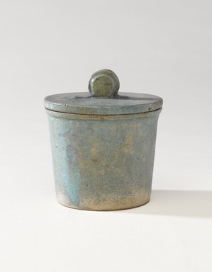  <em>One of a Set of Jars for Seven Sacred Oils or Unguents</em>, 305–30 B.C.E. Faience, 2 1/2 x 2 3/8 in. (6.4 x 6 cm). Brooklyn Museum, Charles Edwin Wilbour Fund, 49.52.4a-b. Creative Commons-BY (Photo: Brooklyn Museum, 49.52.4a-b_PS9.jpg)