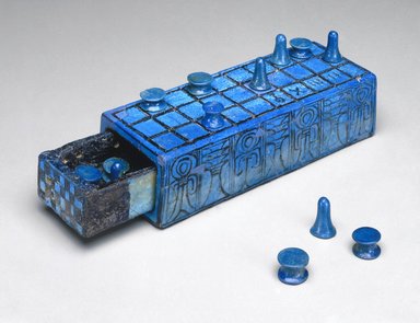  <em>Set of Thirteen Gaming Pieces</em>, ca. 1390–1353 B.C.E. Faience, Greatest dimensions for reel-shaped pieces: 1/2 x Diam. 13/16 in. (1.3 x 2 cm). Brooklyn Museum, Charles Edwin Wilbour Fund, 49.57.1-.13. Creative Commons-BY (Photo: , 49.56a-b_49.57.1-.13_SL1.jpg)