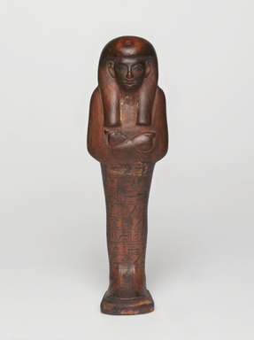  <em>Shabty of the Scribe Amunemhat</em>, ca. 1400–1336 B.C.E. Wood, pigment (Egyptian blue), 8 9/16 × 2 9/16 × 1 7/8 in. (21.8 × 6.5 × 4.8 cm). Brooklyn Museum, Charles Edwin Wilbour Fund, 50.129. Creative Commons-BY (Photo: , 50.129_PS9.jpg)