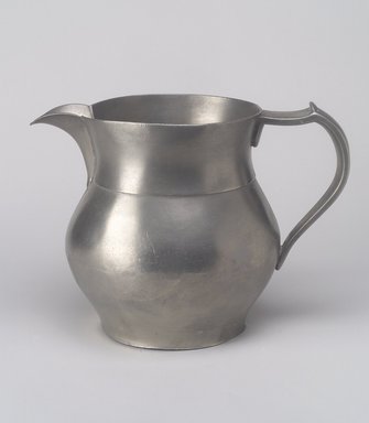 American. <em>Water Pitcher</em>, 1837-1860. Pewter, 6 1/4 x 8 3/8 x 5 7/8 in. (15.9 x 21.3 x 14.9 cm). Brooklyn Museum, Bequest of Mrs. William Sterling Peters, 50.141.37. Creative Commons-BY (Photo: Brooklyn Museum, 50.141.37.jpg)