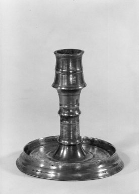 British. <em>Candlestick</em>, 17th century. Bell metal, 6 7/8 x 6 1/4 in. (17.5 x 15.9 cm). Brooklyn Museum, Bequest of Mrs. William Sterling Peters, 50.141.92. Creative Commons-BY (Photo: Brooklyn Museum, 50.141.92_acetate_bw.jpg)