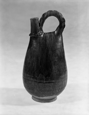  <em>Pilgrim Bottle</em>, 907-1125. Earthenware, green glaze, 10 9/16 in. (26.8 cm). Brooklyn Museum, Gift of Horace O. Havemeyer,  by exchange, 50.162. Creative Commons-BY (Photo: Brooklyn Museum, 50.162_bw.jpg)