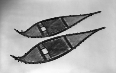 Chippewa (Anishinaabe). <em>Snow Shoes</em>, early 19th century. Pigment, Stroud cloth, wood, fiber, 55 x 13 in. (139.7 x 33 cm). Brooklyn Museum, Henry L. Batterman Fund and the Frank Sherman Benson Fund, 50.67.159a-b. Creative Commons-BY (Photo: Brooklyn Museum, 50.67.159a-b_acetate_bw.jpg)