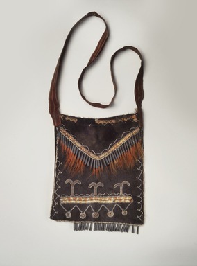 Delaware. <em>Black Pouch</em>, late 18th–early 19th century. Buckskin, porcupine quills, tin, deer hair, ribbon, glass beads, commercial cloth, 10 x 8 1/2 in. (25.4 x 21.6 cm). Brooklyn Museum, Henry L. Batterman Fund and the Frank Sherman Benson Fund, 50.67.15. Creative Commons-BY (Photo: Brooklyn Museum, 50.67.15_edited.jpg)