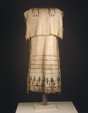 Possibly Yanktonai, Nakota, Sioux. <em>Strap Dress</em>, early 19th century. Buckskin, dyed porcupine quills, glass beads, tinned sheet-iron tinklers, thread (cotton or linen), sinew and pigment, 46 x 21 in.  (116.8 x 53.3 cm). Brooklyn Museum, Henry L. Batterman Fund and Frank Sherman Benson Fund, 50.67.2. Creative Commons-BY (Photo: Brooklyn Museum, 50.67.2_SL1.jpg)