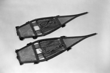 Chippewa (Anishinaabe). <em>Snow Shoes</em>, early 19th century. Wood, cloth, yarn, 41 1/4 x 12 1/4 in. (104.8 x 31.1 cm). Brooklyn Museum, Henry L. Batterman Fund and the Frank Sherman Benson Fund, 50.67.76a-b. Creative Commons-BY (Photo: Brooklyn Museum, 50.67.76a-b_acetate_bw.jpg)