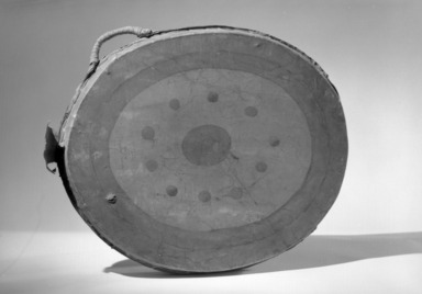 Great Lakes. <em>Double-headed Drum</em>, early 19th century. Hide, wood, pigment, 19 7/8 x 2 1/2 x 16 1/8 in. (50.5 x 6.4 x 41 cm). Brooklyn Museum, Henry L. Batterman Fund and the Frank Sherman Benson Fund, 50.67.81. Creative Commons-BY (Photo: Brooklyn Museum, 50.67.81_acetate_bw.jpg)