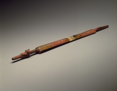 Eastern, Sioux. <em>Canine Effigy Pipe Stem</em>, early 19th century. Wood, pigment, brass tacks, sinew, bird skin, blue jay feathers, 26 in. (66 cm). Brooklyn Museum, Henry L. Batterman Fund and the Frank Sherman Benson Fund, 50.67.85. Creative Commons-BY (Photo: Brooklyn Museum, 50.67.85_SL3.jpg)