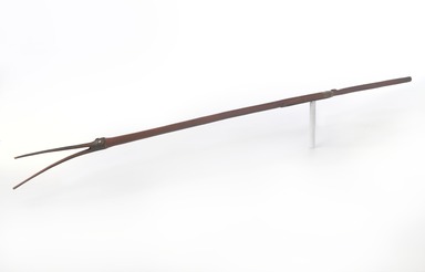 Chippewa (Anishinaabe). <em>Whistle with Carved Design of Long-beaked Water Bird</em>, early 19th century. Wood, birchbark, sinew, pigment, brass, 36 1/2 x 2 1/2 x 7/8 in. (92.7 x 6.4 x 2.2 cm). Brooklyn Museum, Henry L. Batterman Fund and the Frank Sherman Benson Fund, 50.67.91. Creative Commons-BY (Photo: Brooklyn Museum, 50.67.91_view1_PS9.jpg)