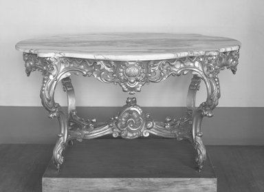  <em>Center Table</em>, ca. 1845. Wood, marble, gesso, gilt and casters, 30 x 56 3/4 x 37 1/2 in.  (76.2 x 144.1 x 95.3 cm). Brooklyn Museum, Gift of Marion Litchfield, 51.112.9a-f. Creative Commons-BY (Photo: Brooklyn Museum, 51.112.9a-b_acetate_bw.jpg)