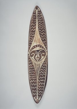 Era River. <em>Carved and Painted Board (Gope)</em>, early 20th century. Wood, natural pigments, 53 x 11 x 2 1/2 in. (134.6 x 27.9 x 6.4 cm). Brooklyn Museum, Gift of John W. Vandercook, 51.118.5. Creative Commons-BY (Photo: Brooklyn Museum, 51.118.5.jpg)