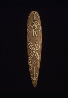  <em>Spirit Board (Gope)</em>, early 20th century. Wood, pigment, 43 x 8 1/2 x 2 in. (109.2 x 21.6 x 5.1 cm). Brooklyn Museum, Gift of John W. Vandercook, 51.118.6. Creative Commons-BY (Photo: Brooklyn Museum, 51.118.6_black_background.jpg)