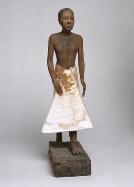  <em>Statue of Metjetji</em>, ca. 2371-2288 B.C.E. Wood, gesso, pigment, alabaster, obsidian, copper alloy, 24 3/16 × 8 1/2 × 13 in. (61.4 × 21.6 × 33 cm). Brooklyn Museum, Charles Edwin Wilbour Fund, 51.1. Creative Commons-BY (Photo: Brooklyn Museum, 51.1_view1_SL1.jpg)