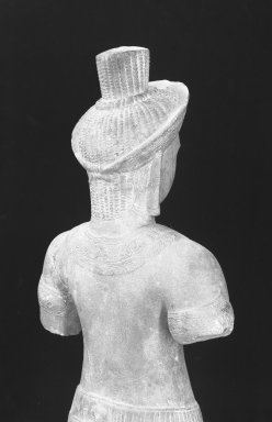  <em>Standing Figure of a Male Deity</em>, 12th century. Brown sandstone, 19 1/2 x 7 1/2 in. (49.6 x 19 cm). Brooklyn Museum, Museum Collection Fund, 51.237. Creative Commons-BY (Photo: Brooklyn Museum, 51.237_back_detail_acetate_bw.jpg)