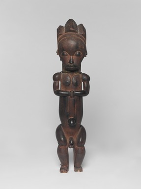 An Ntem River Valley Master. <em>Reliquary Guardian Figure (Eyema-o-Byeri)</em>, mid–18th to mid–19th century. Wood, iron, 23 × 5 3/4 × 5 in. (58.4 × 14.6 × 12.7 cm). Brooklyn Museum, Frank L. Babbott Fund, 51.3. Creative Commons-BY (Photo: , 51.3_overall_PS9.jpg)